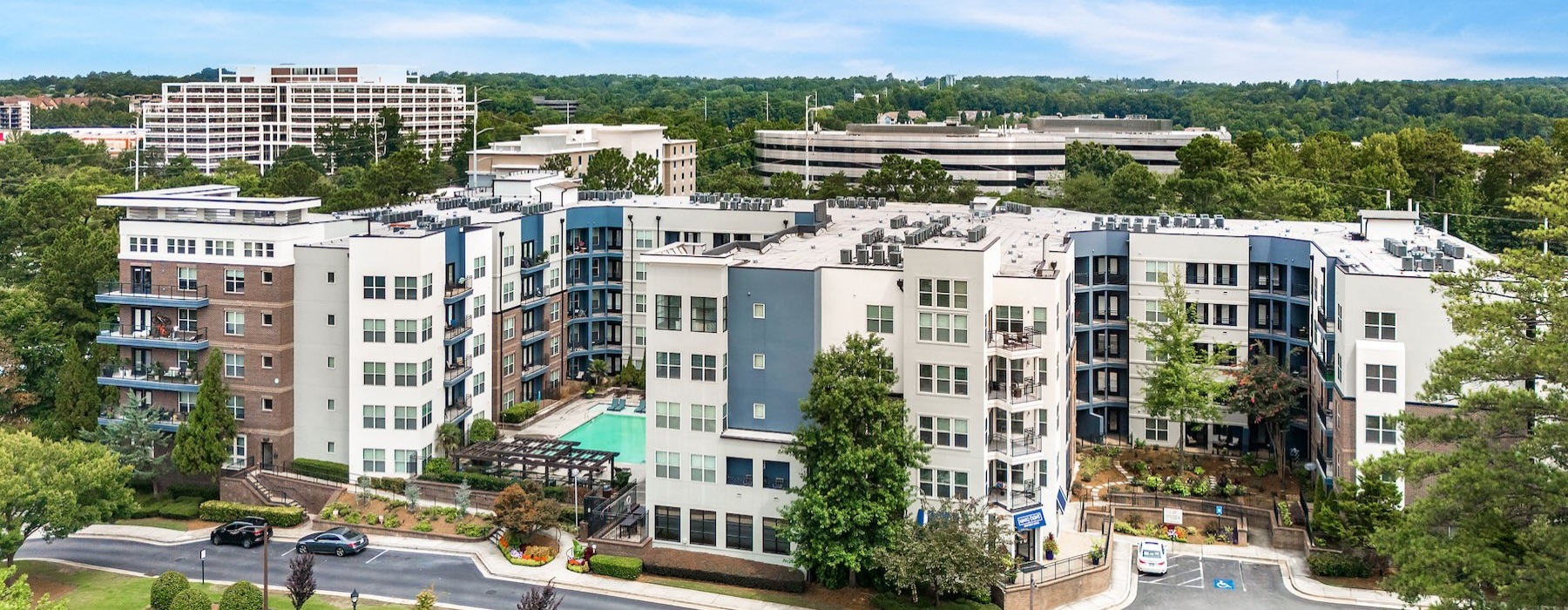aerial view of a group of multi-story buildings
